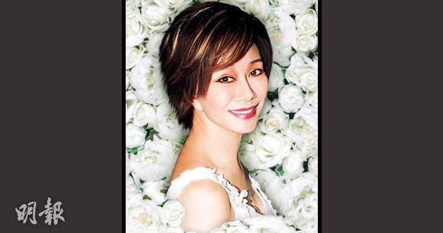 5-01-林燕妮的遗照，选了她笑容灿烂配短发的造型。